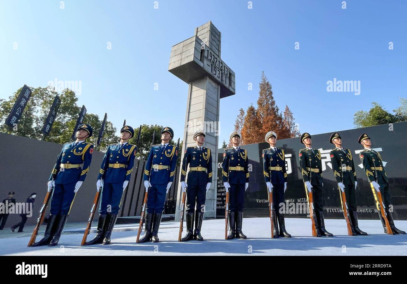 211213 -- NANJING, Dec. 13, 2021 -- China holds its eighth national memorial ceremony for the Nanjing Massacre victims at the Memorial Hall of the Victims in Nanjing Massacre by Japanese Invaders in Nanjing, capital of east China s Jiangsu Province, Dec. 13, 2021.  CHINA-JIANGSU-NANJING MASSACRE VICTIMS-NATIONAL MEMORIAL CEREMONY CN LixBo PUBLICATIONxNOTxINxCHN Stock Photo