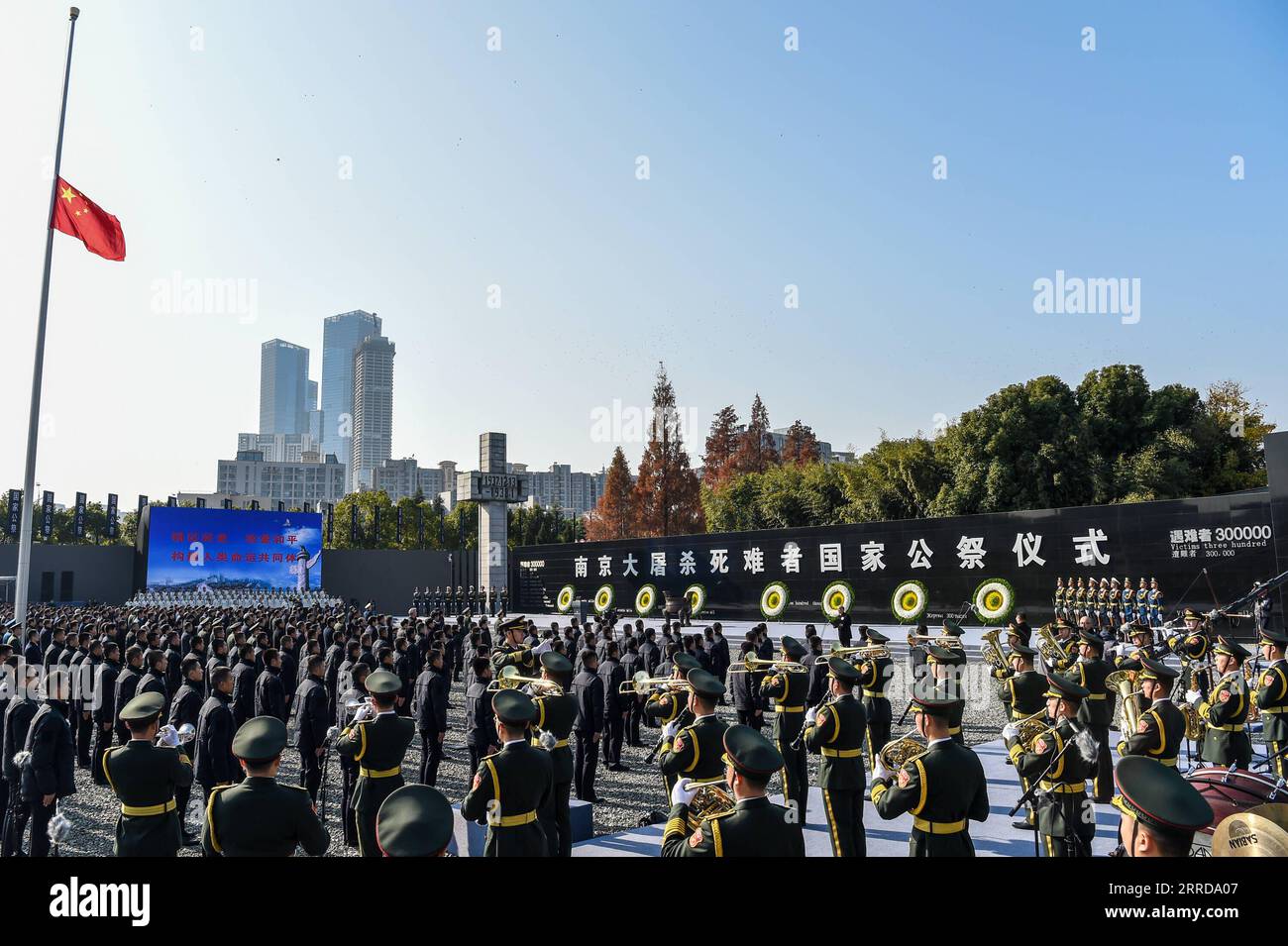 211213 -- NANJING, Dec. 13, 2021 -- China holds its eighth national memorial ceremony for the Nanjing Massacre victims at the Memorial Hall of the Victims in Nanjing Massacre by Japanese Invaders in Nanjing, capital of east China s Jiangsu Province, Dec. 13, 2021.  CHINA-JIANGSU-NANJING MASSACRE VICTIMS-NATIONAL MEMORIAL CEREMONY CN LixBo PUBLICATIONxNOTxINxCHN Stock Photo