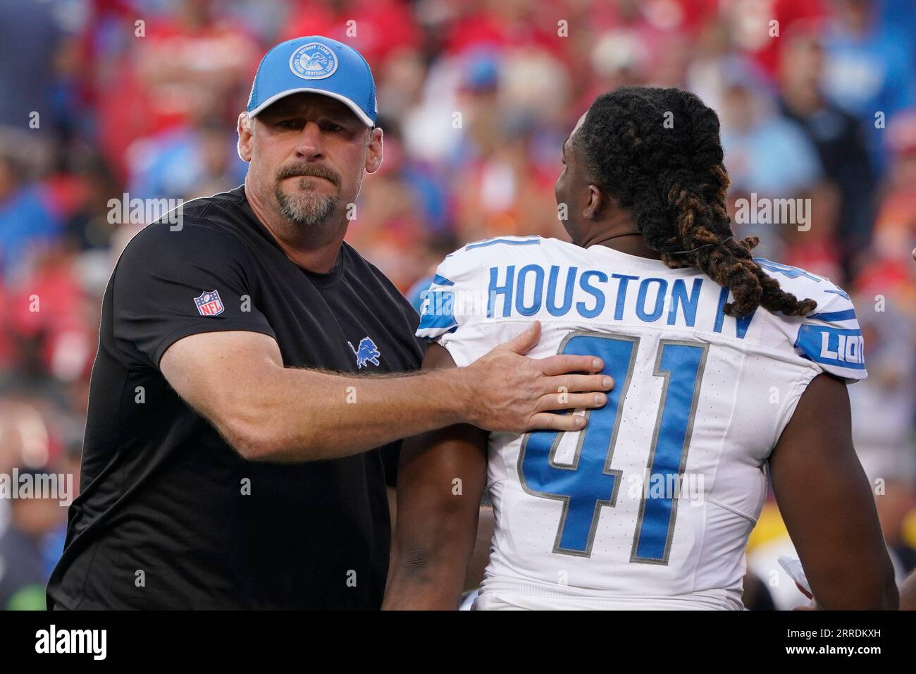 Detroit Lions head coach Dan Campbell greets linebacker James Houston (41)  before the start of an NFL football game between the Detroit Lions and  Kansas City Chiefs Thursday, Sept. 7, 2023, in