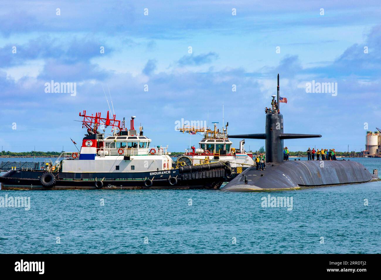 Guam. 28th Aug, 2023. The Ohio-class ballistic-missile submarine USS Kentucky (SSBN 737) arrives at Naval Base Guam, Aug. 28, 2023. The visit reflects the USA resolve and commitment to the Indo-Pacific region with continued extended deterrence to our regional allies and demonstrates the flexibility, survivability, readiness, and capability of U.S. Navy submarine forces. Homeported at Naval Base Kitsap in Washington, USS Kentucky is a launch platform for submarine-launched ballistic missiles, providing the USA with its most survivable leg of the nuclear triad. (Credit Image: © U.S. Navy/ZUMA Stock Photo