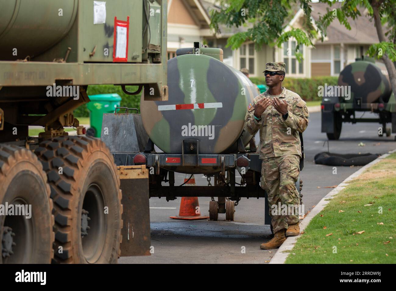 Usa. 30th Aug, 2023. Army Sgt. Marquis Littlejohn, a water treatment specialist and non-commissioned officer-in-charge assigned to the 225th Brigade Support Battalion, 2nd Infantry Brigade Combat Team, 25th Infantry Division and member of Joint Task Force 5-0, conducts water distribution for the residents of Lahaina, Maui, Aug. 30, 2023. Credit: U.S. Army/ZUMA Press Wire/ZUMAPRESS.com/Alamy Live News Stock Photo