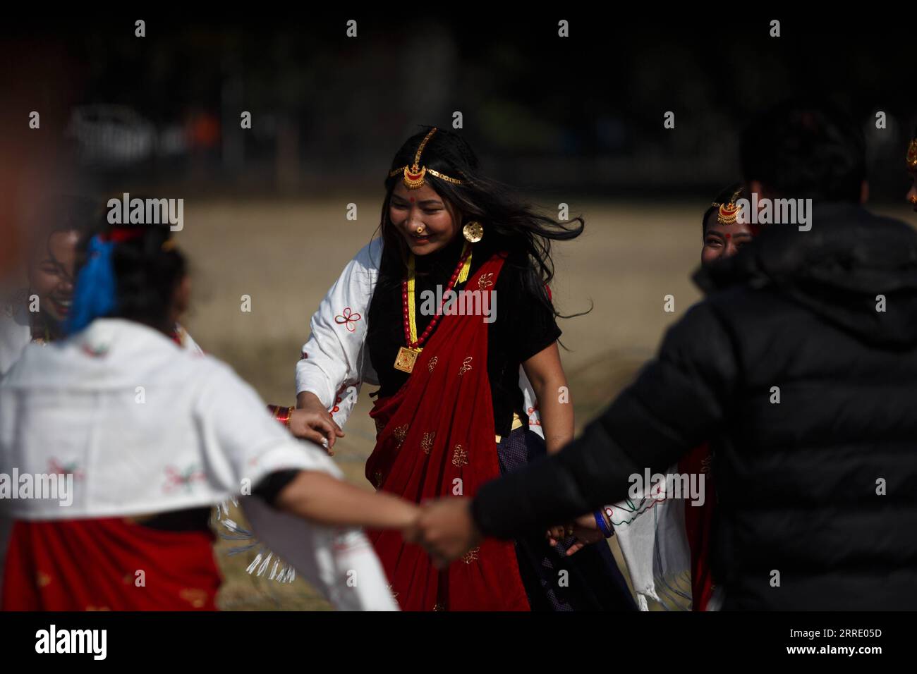 220115 KATHMANDU, Jan. 15, 2022 Women in traditional attire