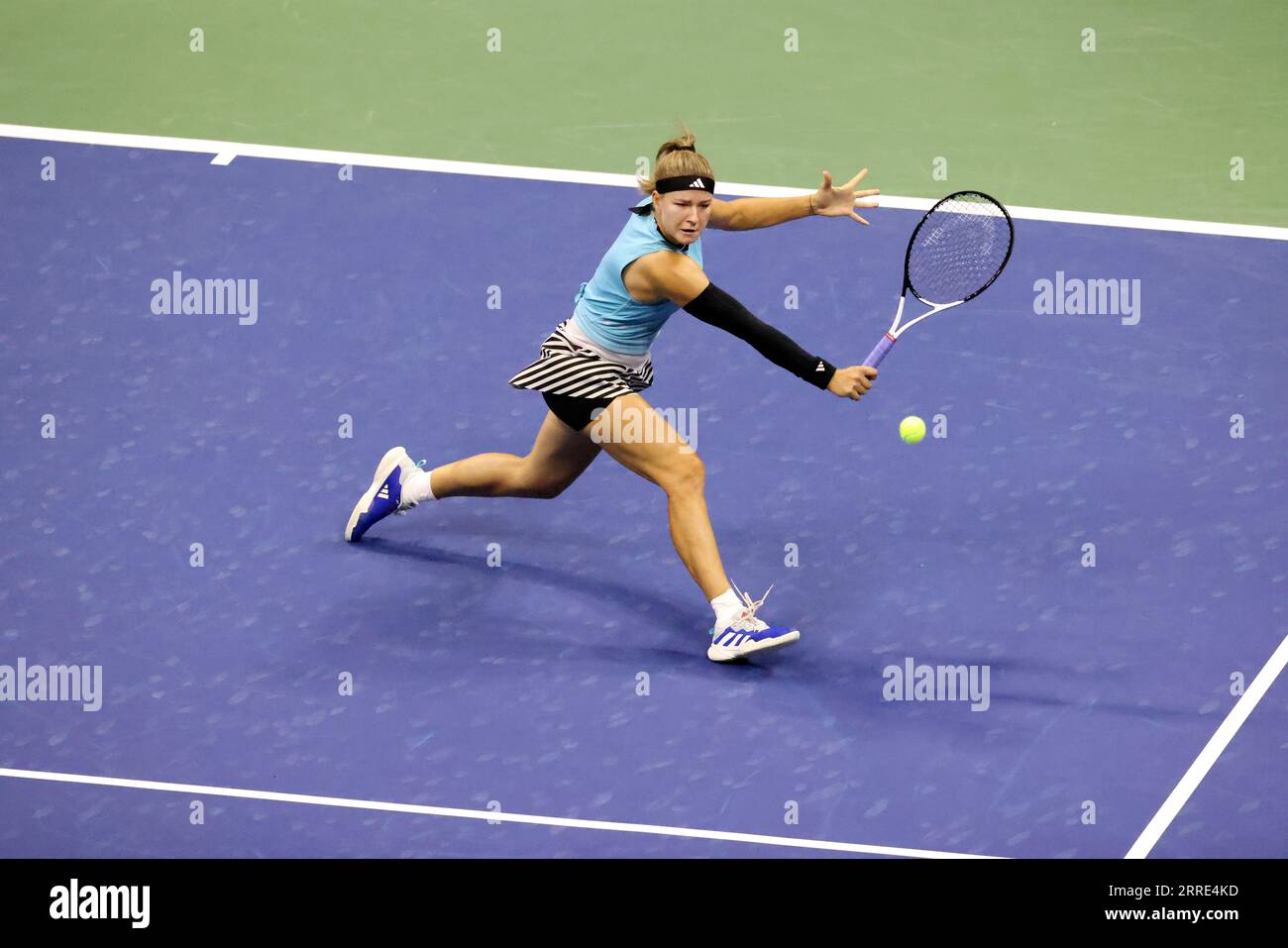 New York, United States. 07th Sep, 2023. Karolina Muchova comes in for a volley to Coco Gauff during their semifinal match at the US Open. Photography by Credit: Adam Stoltman/Alamy Live News Stock Photo