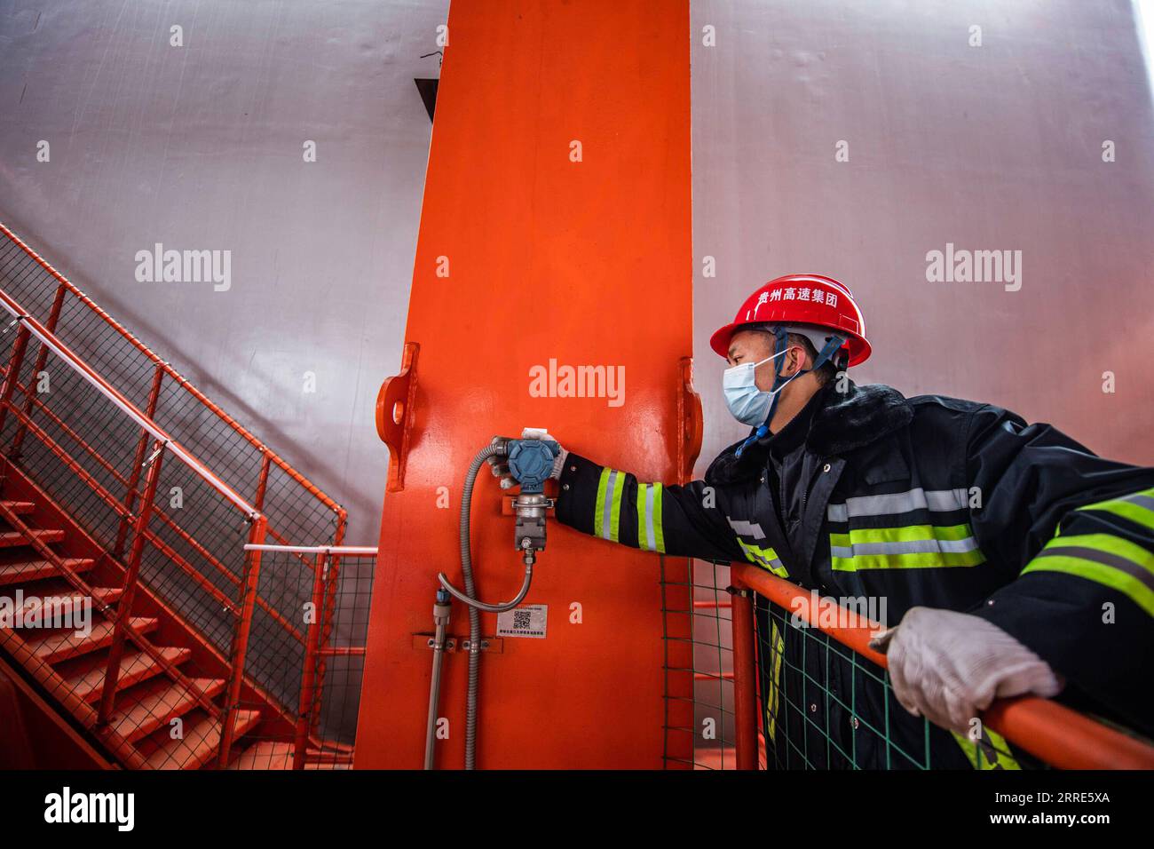 220130 -- LIUPANSHUI, Jan. 30, 2022 -- A maintenance worker examines the interior of the Beipanjiang Bridge in southwest China s Guizhou Province, Jan. 29, 2022. Sitting over 565.4 meters above a valley, the Beipanjiang Bridge has been certified as the world s highest bridge by the Guinness World Records. Spanning 1,341.4 meters, the bridge links Duge Township of Liupanshui in southwest China s Guizhou with Puli Township of Xuanwei in southwest China s Yunnan Province.  CHINA-GUIZHOU-LIUPANSHUI-BEIPANJIANG BRIDGE-MAINTENANCECN TaoxLiang PUBLICATIONxNOTxINxCHN Stock Photo