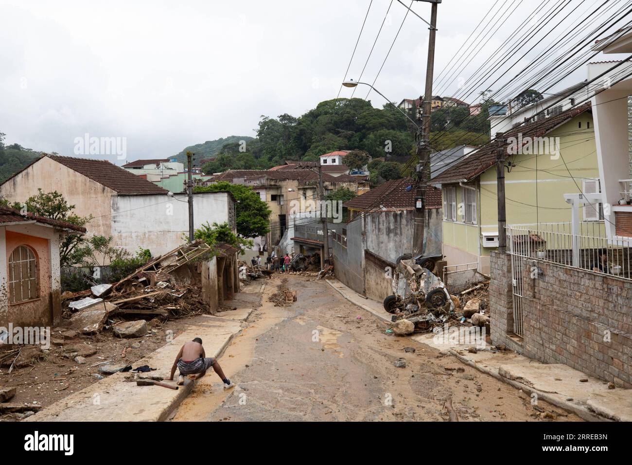 220217 -- PETROPOLIS, Feb. 17, 2022 -- Damaged buildings are seen after heavy rains in Petropolis in the state of Rio de Janeiro, Brazil, Feb. 16, 2022. The death toll from landslides and floods in the Brazilian city of Petropolis in Rio de Janeiro state rose to 78, including six children, local authorities said Wednesday.  BRAZIL-RIO DE JANEIRO-PETROPOLIS-HEAVY RAINS-AFTERMATH WangxTiancong PUBLICATIONxNOTxINxCHN Stock Photo