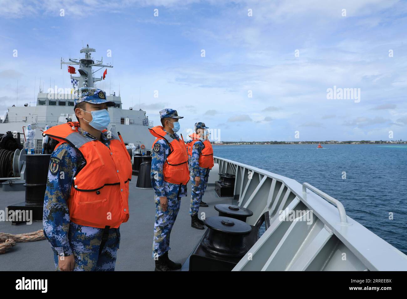 220224 -- NUKU ALOFA, Feb. 24, 2022 -- A flotilla of the Chinese People s Liberation Army PLA Navy departs from the port of Nuku alofa in Tonga, Feb. 23, 2022. The flotilla comprised of two ships of the PLA Navy departed the port of Nuku alofa on Wednesday after delivering China s disaster relief supplies to the South Pacific island nation of Tonga. Weighing approximately 1,400 tonnes, the latest supplies include mobile homes, tractors, electricity generators, water pumps, water purifiers, food and medical supplies. Photo by /Xinhua TONGA-CHINESE NAVY SHIPS-RELIEF SUPPLIES-DEPARTURE XuexChengq Stock Photo