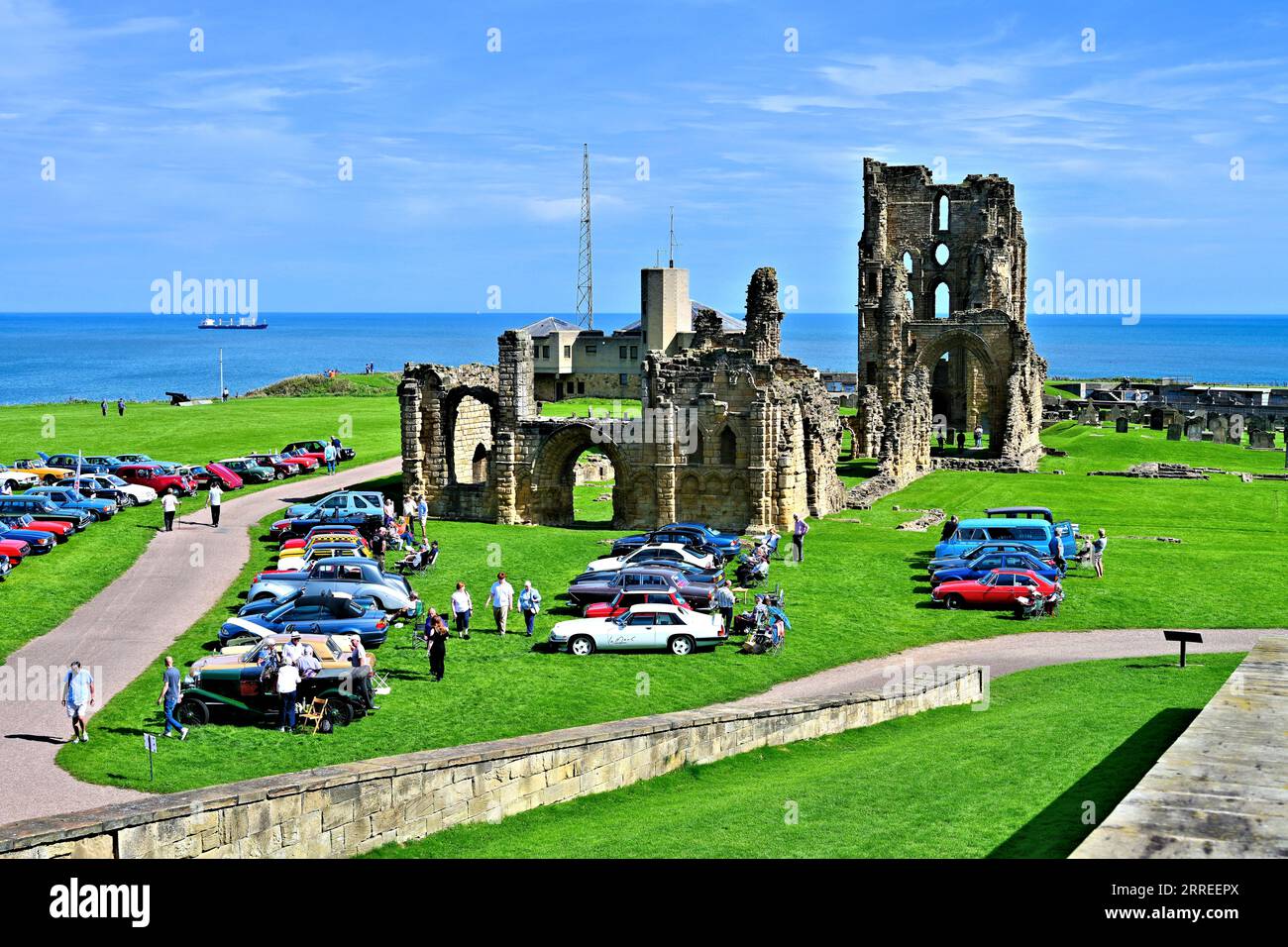 English Heritage Tynemouth Priory and Castle site with the North  East Classic Car Collectors showing on this glorious summers day Stock Photo