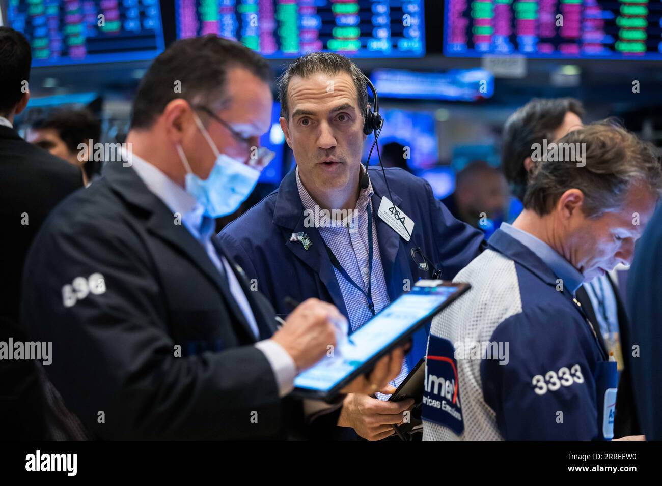 220224 -- NEW YORK, Feb. 24, 2022 -- Traders work at the New York Stock Exchange in New York, the United States, Feb. 24, 2022. U.S. stocks finished higher on Thursday, reversing the massive losses earlier in the session, as investors assessed the geopolitical tensions over Ukraine. The Dow Jones Industrial Average rose 92.07 points, or 0.28 percent, to 33,223.83. The S&P 500 climbed 63.20 points, or 1.50 percent, to 4,288.70. The Nasdaq Composite Index increased 436.09 points, or 3.34 percent, to 13,473.58. Earlier in the day, all the three major indexes fell sharply with the Dow dropping mor Stock Photo