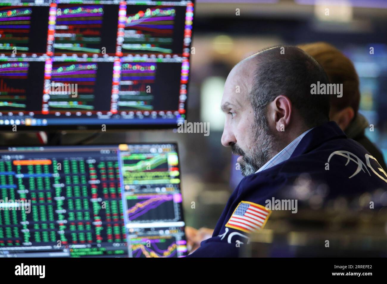 220226 -- NEW YORK, Feb. 26, 2022 -- A trader works at the New York Stock Exchange in New York, the United States, Feb. 25, 2022. U.S. stocks surged on Friday with the Dow logging its best day in over a year, as Wall Street closely followed updates on the Russia-Ukraine tensions. The Dow Jones Industrial Average jumped 834.92 points, or 2.51 percent, to 34,058.75. The S&P 500 rose 95.95 points, or 2.24 percent, to 4,384.65. The Nasdaq Composite Index increased 221.03 points, or 1.64 percent, to 13,694.62.  U.S.-NEW YORK-STOCK MARKET WangxYing PUBLICATIONxNOTxINxCHN Stock Photo