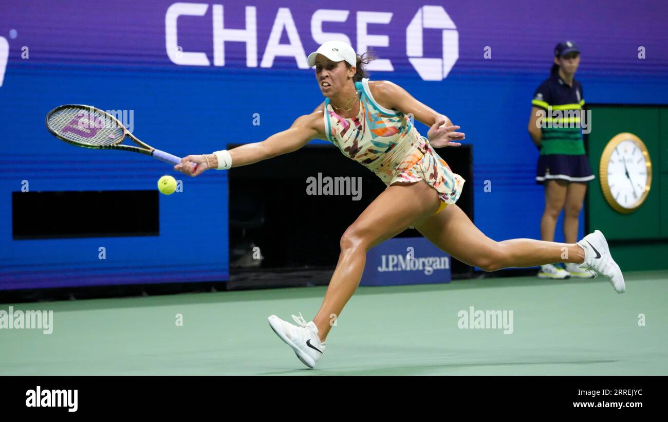 Madison Keys, of the United States, returns a shot to Aryna Sabalenka, of Belarus, during the