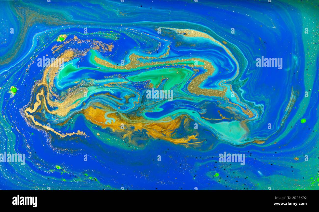 Liquid Flow of Gold and Blue Acrylic Pattern Stock Photo - Alamy