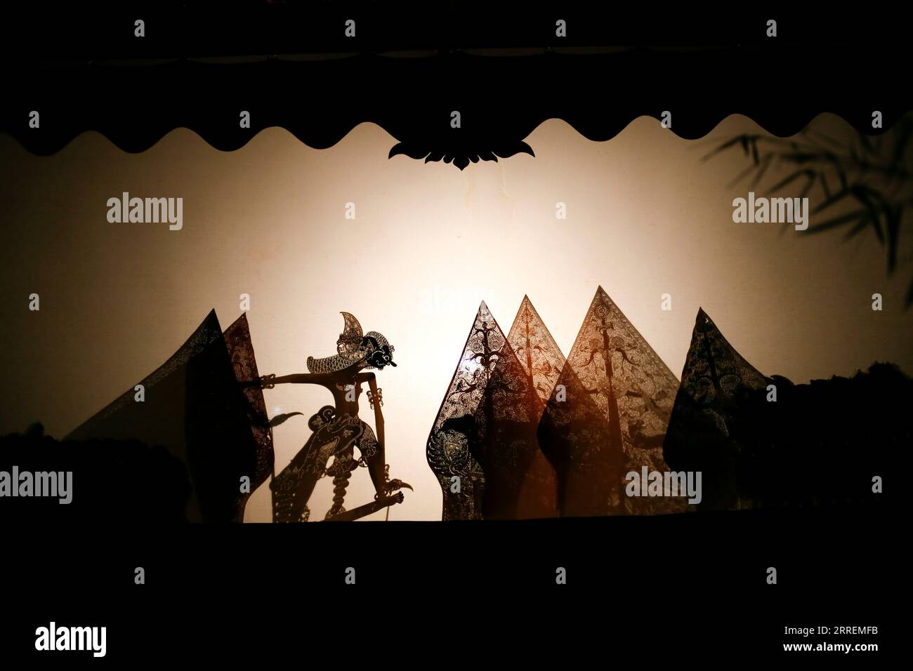 Wayang or shadow puppet performing in the screen Stock Photo