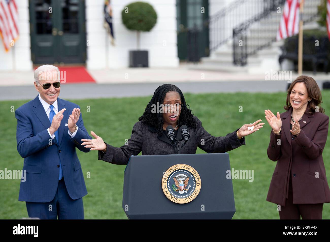220408 -- WASHINGTON, April 8, 2022 -- Judge Ketanji Brown Jackson C, U.S. President Joe Biden L and Vice President Kamala Harris attend an event marking the Senate confirmation of Jackson for the Supreme Court at the South Lawn of the White House in Washington, D.C., the United States, on April 8, 2022. The White House held the event Friday afternoon to mark the Senate confirmation of the first African American woman for the Supreme Court.  U.S.-WASHINGTON, D.C.-WHITE HOUSE-JUDGE KETANJI BROWN JACKSON-SUPREME COURT-CONFIRMATION LiuxJie PUBLICATIONxNOTxINxCHN Stock Photo