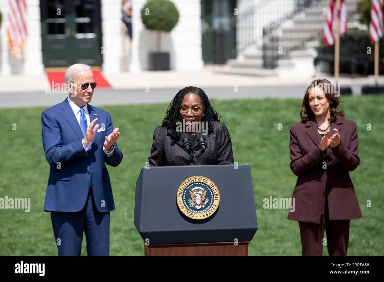 220408 -- WASHINGTON, April 8, 2022 -- Judge Ketanji Brown Jackson C, U.S. President Joe Biden L and Vice President Kamala Harris attend an event marking the Senate confirmation of Jackson for the Supreme Court at the South Lawn of the White House in Washington, D.C., the United States, on April 8, 2022. The White House held the event Friday afternoon to mark the Senate confirmation of the first African American woman for the Supreme Court.  U.S.-WASHINGTON, D.C.-WHITE HOUSE-JUDGE KETANJI BROWN JACKSON-SUPREME COURT-CONFIRMATION LiuxJie PUBLICATIONxNOTxINxCHN Stock Photo