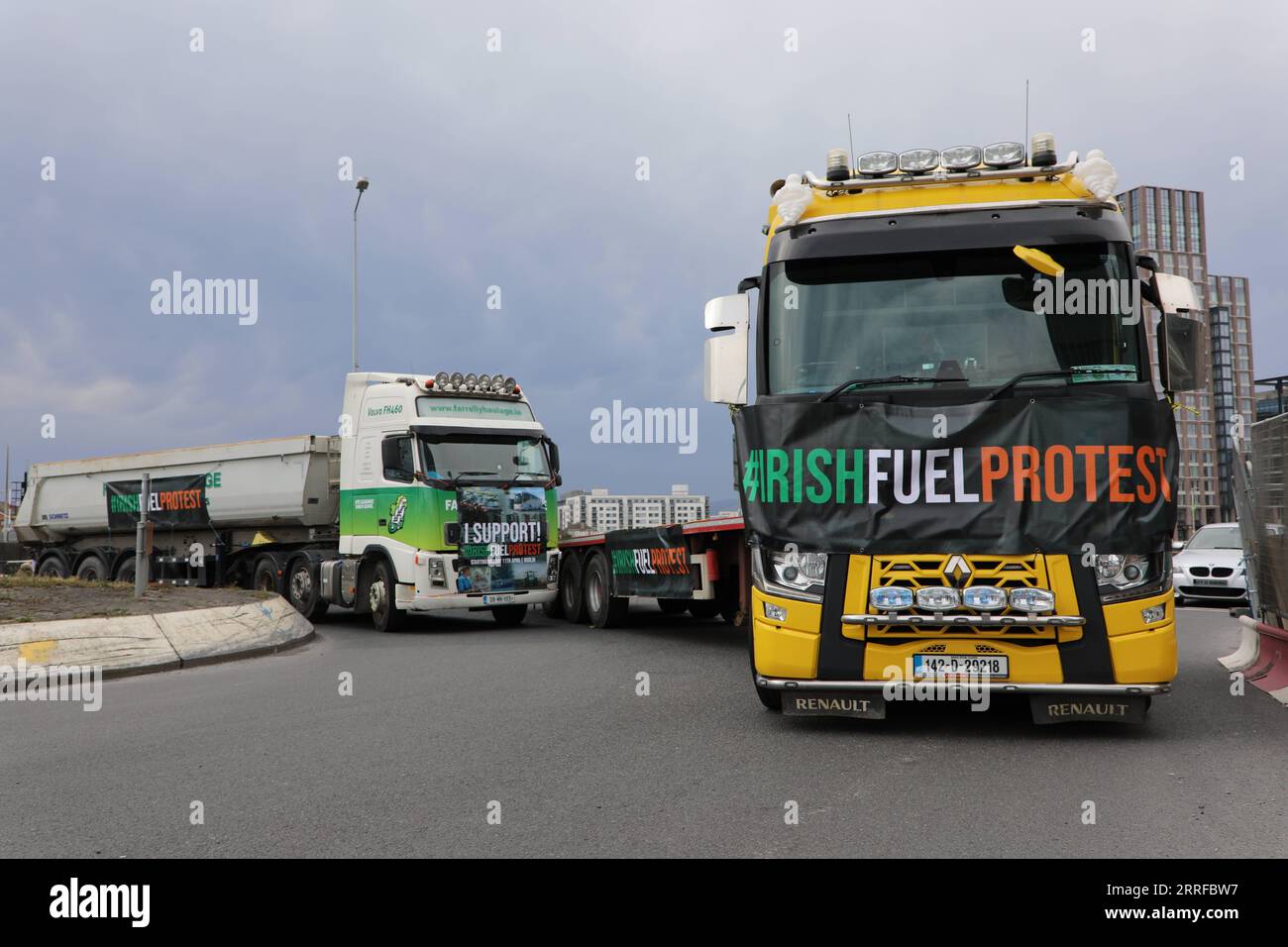 220411 -- DUBLIN, April 11, 2022 -- Trucks are seen on a road during a protest in Dublin, Ireland, on April 11, 2022. Dozens of trucks blocked the roads leading to Dublin Port in the eastern part of the Irish capital on Monday in a protest against soaring fuel prices, causing serious disruptions to businesses and public life in the surrounding areas. Photo by /Xinhua IRELAND-DUBLIN-FUEL PRICES-PROTEST LiuxXiaoming PUBLICATIONxNOTxINxCHN Stock Photo