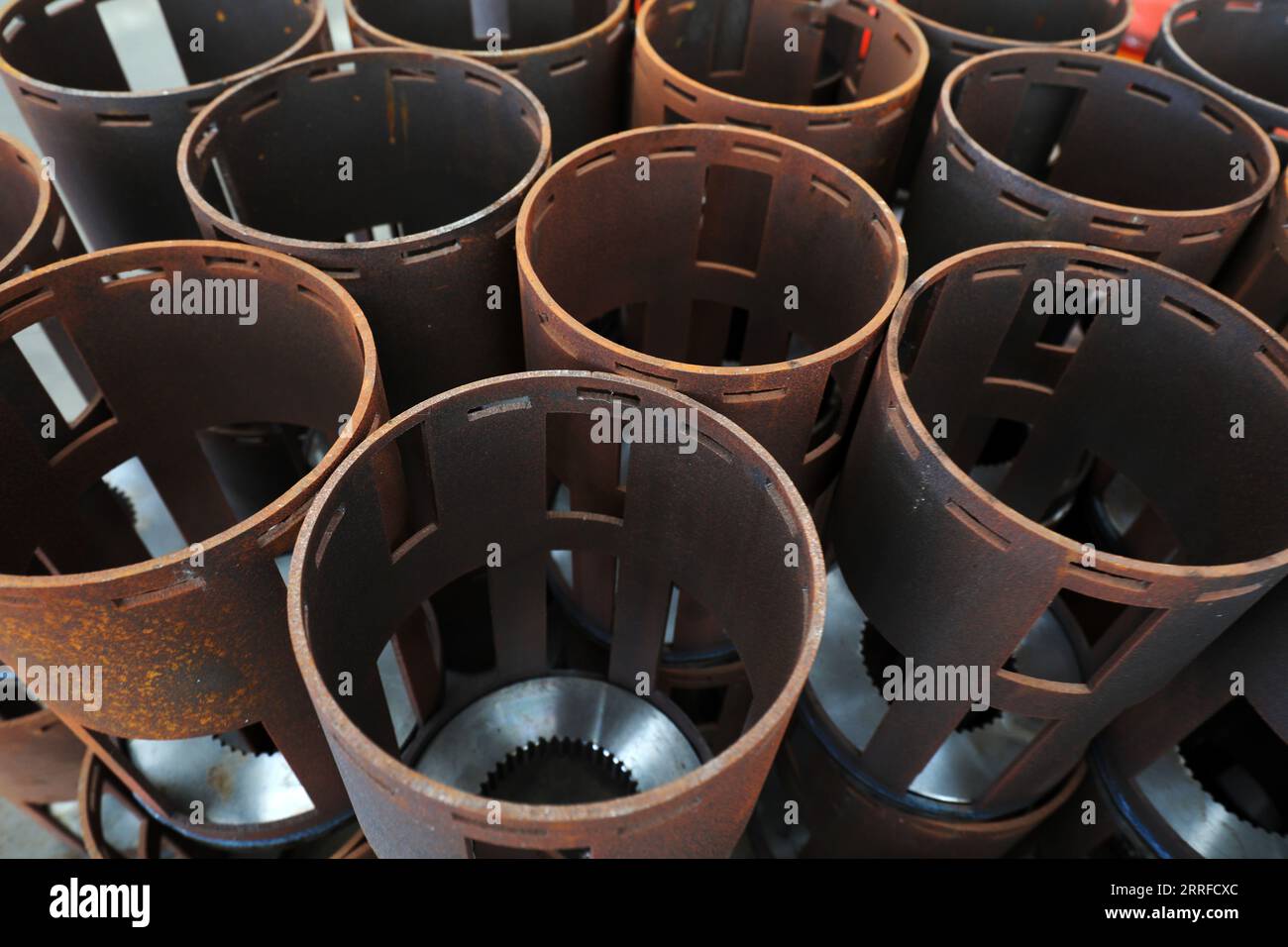 Rusty Factory Components Metal parts in barrel Stock Photo - Alamy