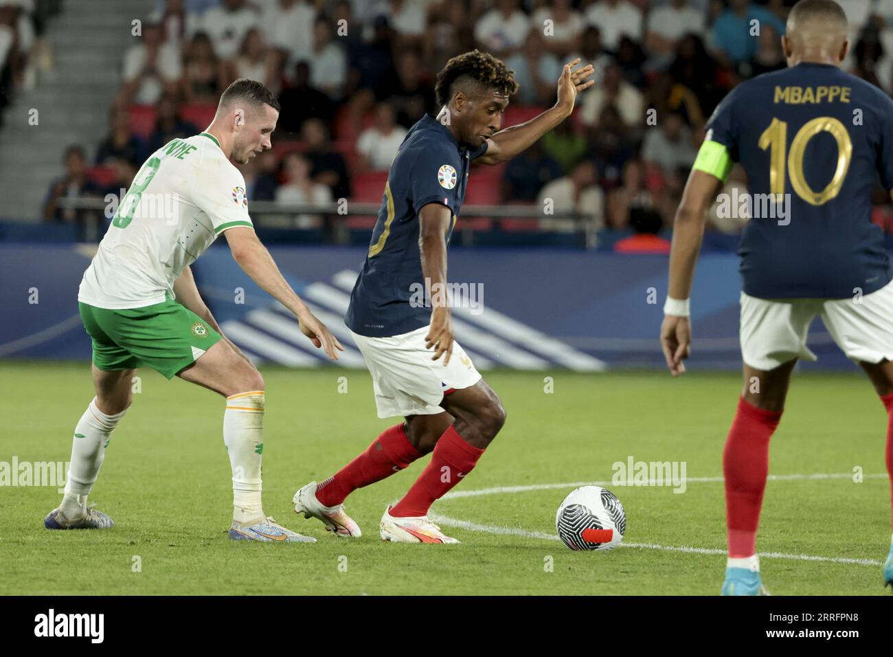 Kingsley Coman of France, left Alan Browne of Ireland during the UEFA Euro 2024, European Qualifiers Group B football match between France and Republic of Ireland on September 7, 2023 at Parc des Princes stadium in Paris, France Stock Photo