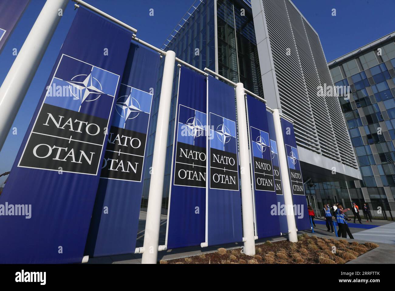 220426 -- BEIJING, April 26, 2022 -- Staff members work at the NATO Headquarters in Brussels, Belgium, March 24, 2022.  Xinhua Headlines: Uncovering untold secrets of NATO -- a monstrous remnant from Cold War days ZhengxHuansong PUBLICATIONxNOTxINxCHN Stock Photo