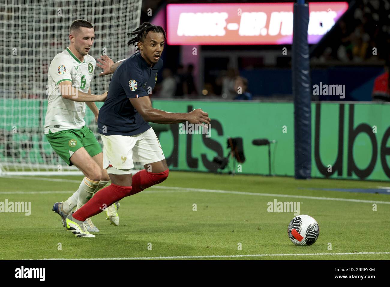 Jules Kounde of France, left Alan Browne of Ireland during the UEFA Euro 2024, European Qualifiers Group B football match between France and Republic of Ireland on September 7, 2023 at Parc des Princes stadium in Paris, France Stock Photo