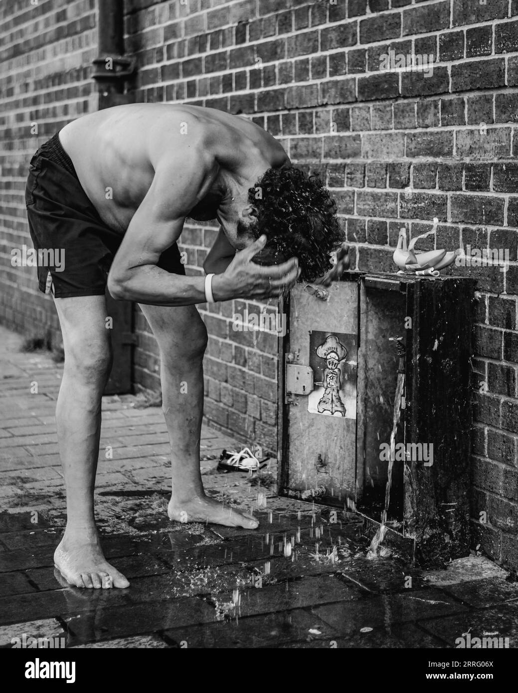 A man tries to keep cool in London's unexpected seering heat. Stock Photo