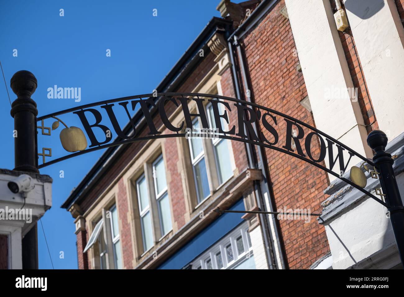 Butchers Row Grantham Lincolnshire – A overhead traditional metal sign as you enter the street against a blue summer sky Stock Photo