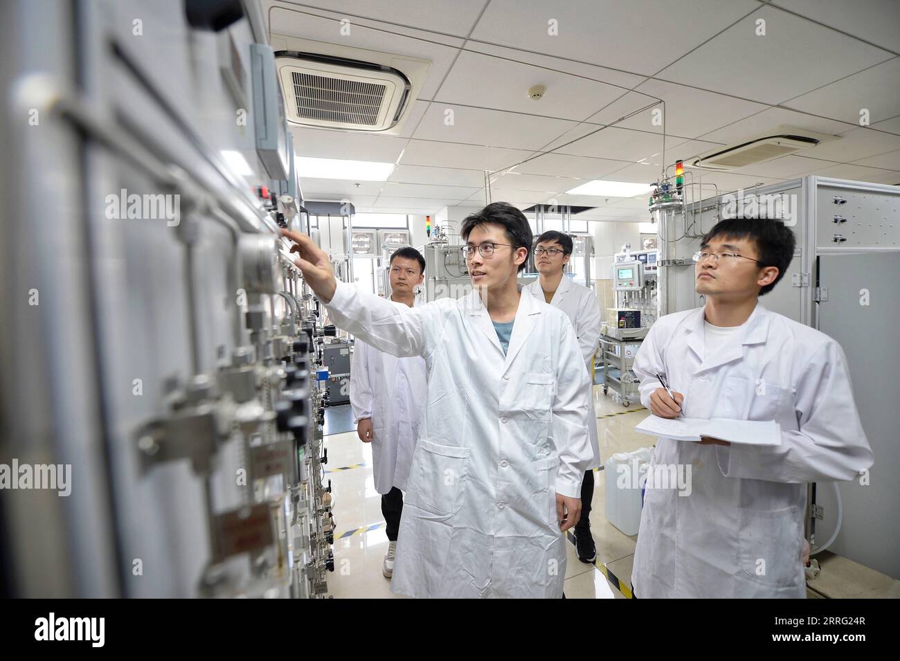 220504 -- CHENGDU, May 4, 2022 -- Members of a R&D team work in a laboratory of Nuclear Power Institute of China in Chengdu, southwest China s Sichuan Province, April 28, 2022. Fuel assemblies are the core of nuclear reactor. Engineers and researchers of Nuclear Power Institute of China have worked for years to develop China s own fuel assembly of commercial nuclear power plants, which was previously dominated by foreign technology. On Oct. 27, 2019, the first batch of 20 groups of CF3 fuel assemblies with independent intellectual property rights were loaded into nuclear power plant. The achie Stock Photo