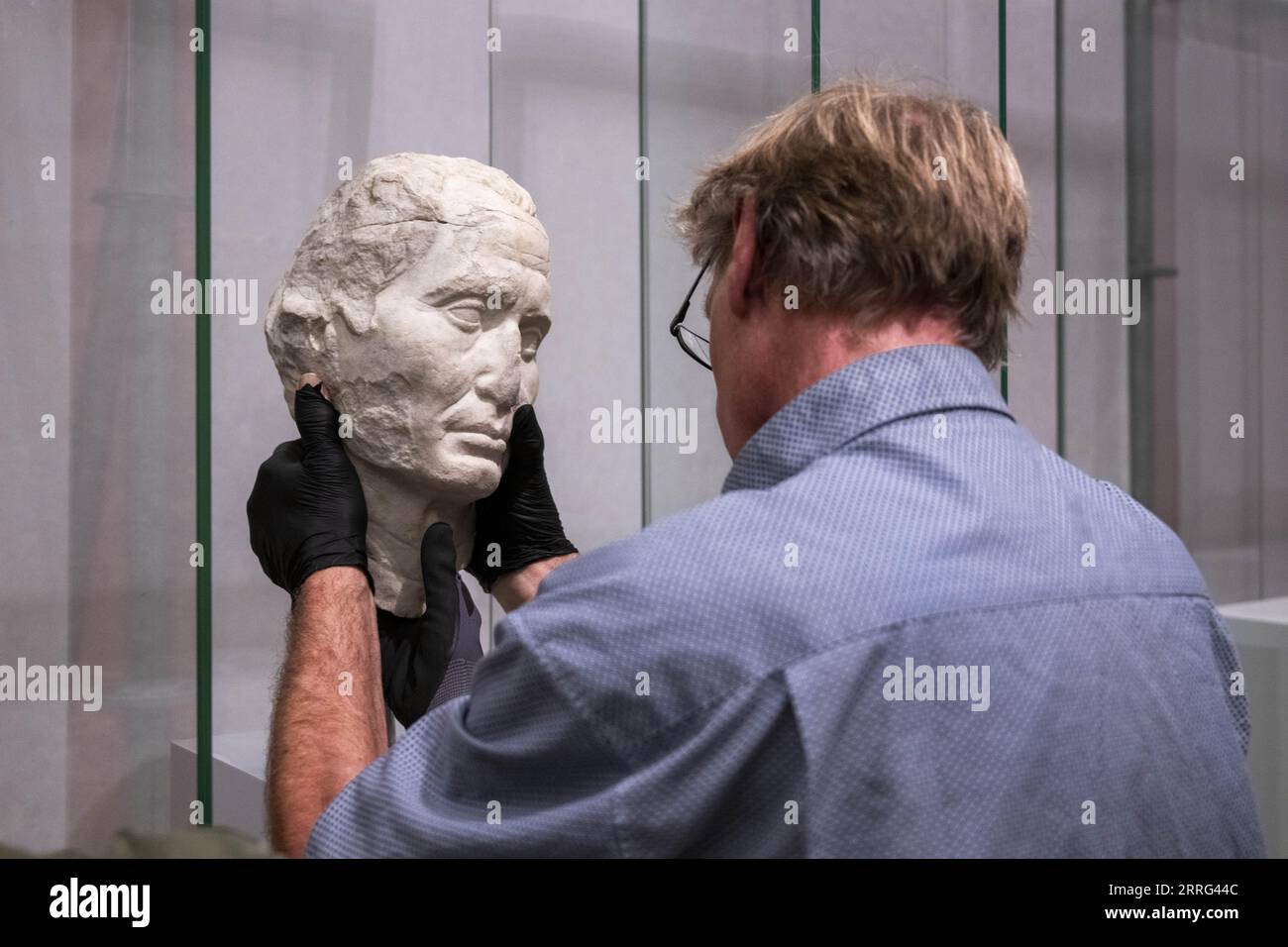 AMSTERDAM - In HART Museum, former Museum Hermitage Amsterdam, the work of art the Bust of Caesar from the Museo Nazionale Romano is unpacked. The artwork is one of the highlights from the first exhibition that the museum will show under the new name. ANP EVERT ELZINGA netherlands out - belgium out Stock Photo