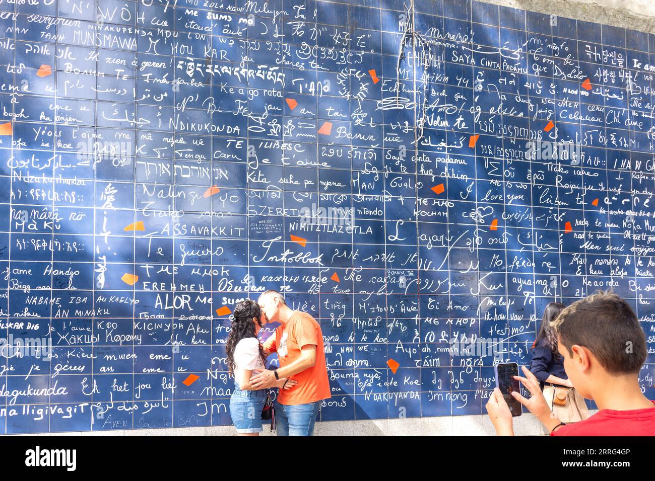 'I love you' in multiple languages on the 'Wall of Love' (Le Mur des Je t'aime), Place des Abbesses, Montmartre, Paris, Île-de-France, France Stock Photo