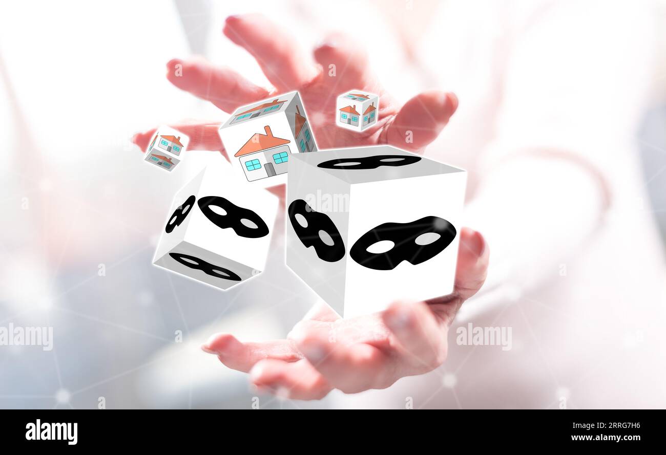 Home burglary concept between hands of a woman in background Stock Photo
