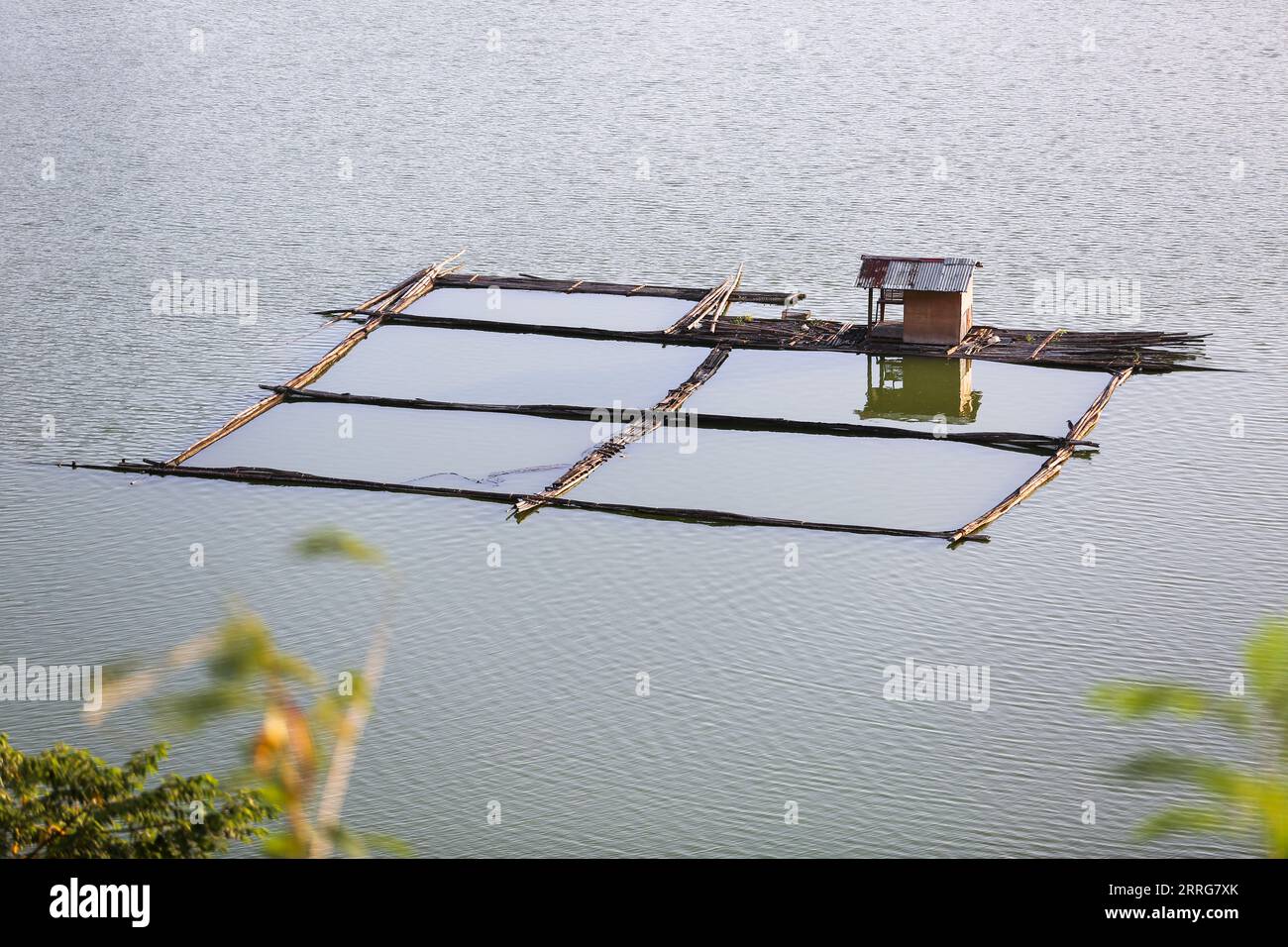 Dolores, Quezon, Philippines: Gunao Lake, round old volcano crater part of Twin Lakes, fish farm cages, fishponds, near San Pablo city of seven lakes Stock Photo
