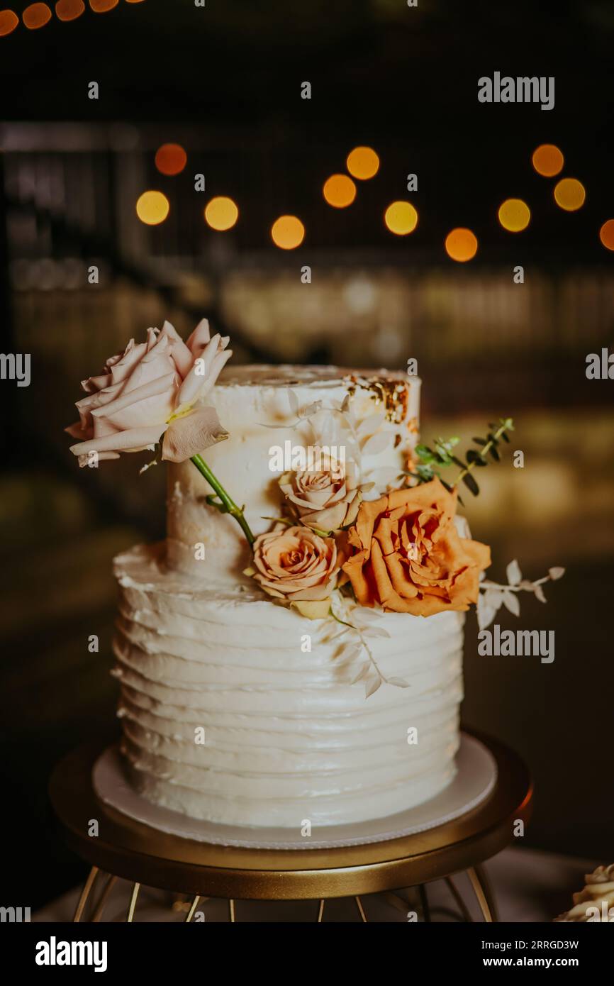 Floral wedding cake at wedding in Nashville, TN Stock Photo Alamy