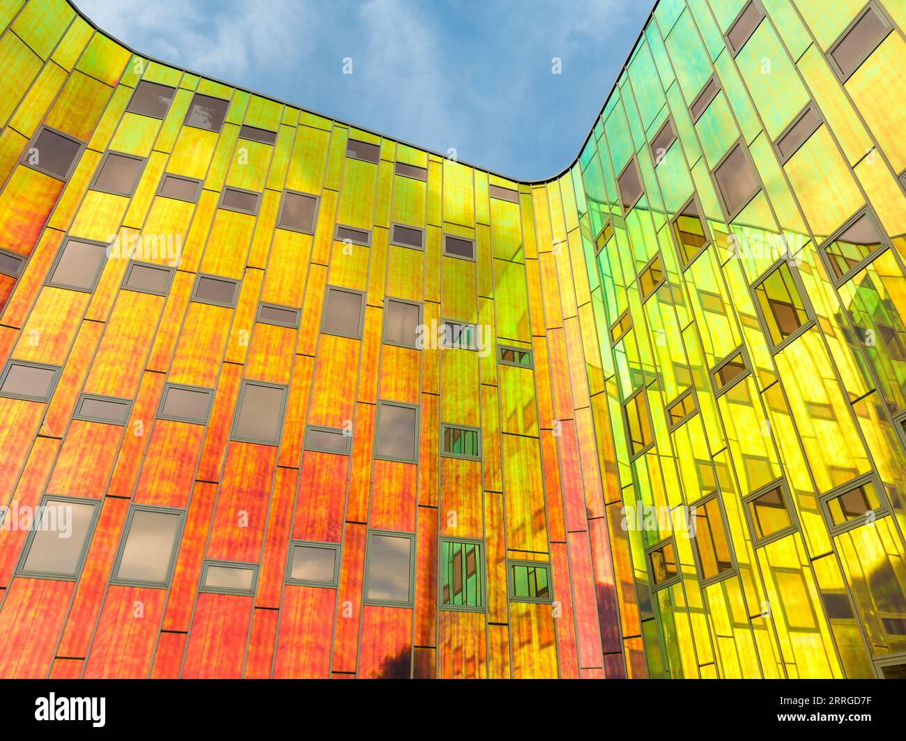 DEVENTER, NETHERLANDS - AUGUST 18, 2023: Colorful facade of a modern office building. The building is called L'Arc en Ciel, designed by L'M Architects Stock Photo