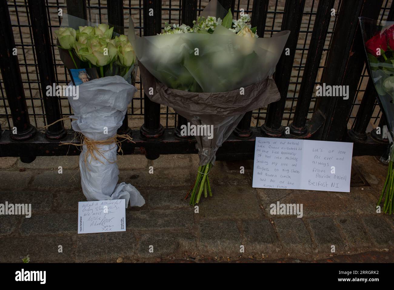 London, UK. 8th Sep, 2023. Flowers and a picture and notes left on Buckingham palace gates for the first anniversary of the late Queen Elizabeth ll death Credit: Richard Lincoln/Alamy Live News Stock Photo