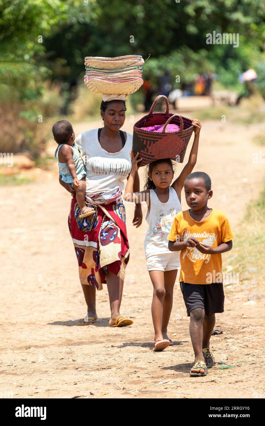 Miandrivazo, Madagascar - November 2nd, 2022: A group of Malagasy people on the streets of Miandrivazo. Stock Photo