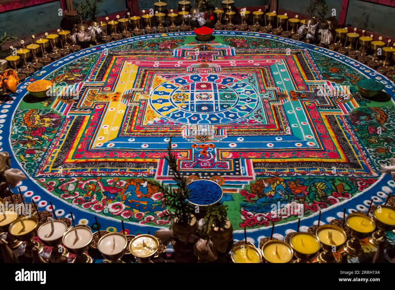 A mandala made of colored sand for Buddhist meditation in a monastery in Tibet Stock Photo
