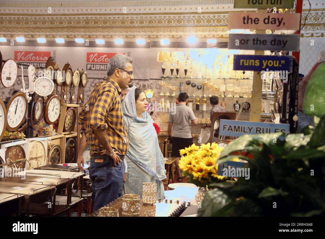 220610 RAWALPINDI, June 10, 2022 People visit a furniture and