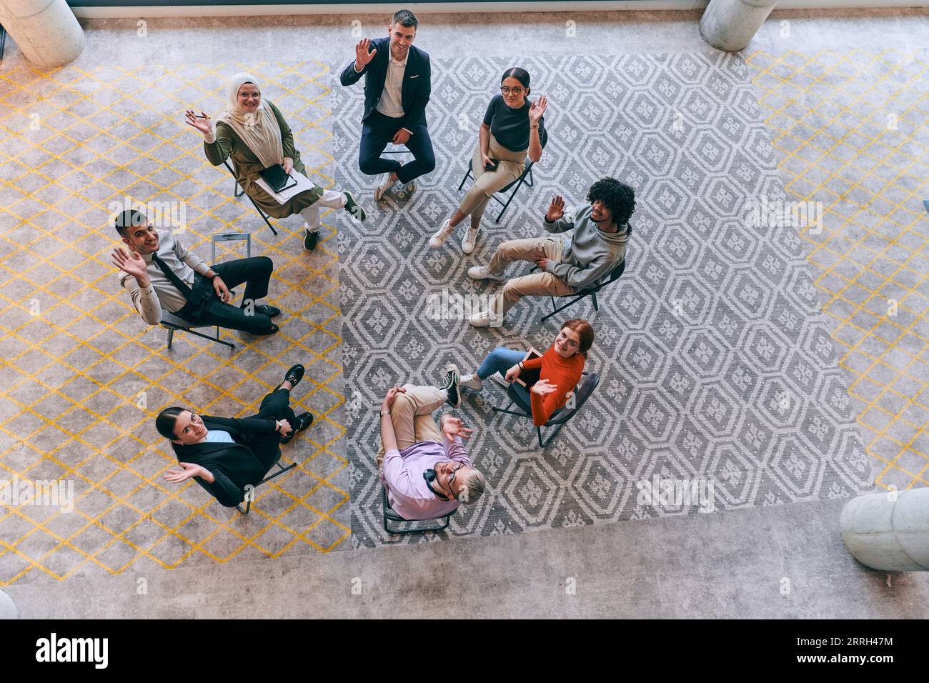 Top view of a diverse group of young business entrepreneurs gathered in ...
