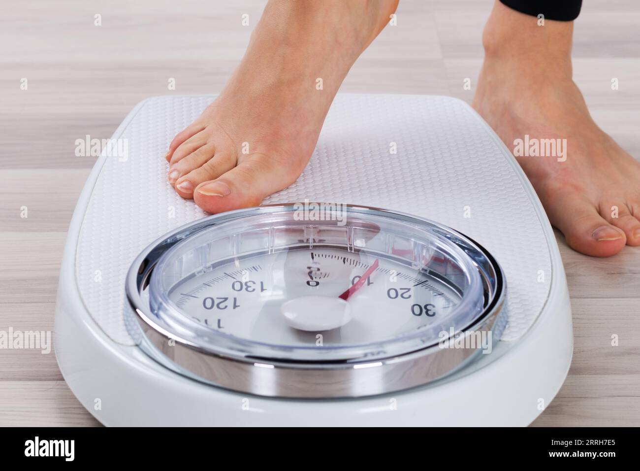 Girl scales weighing weight hi-res stock photography and images - Page 3 -  Alamy