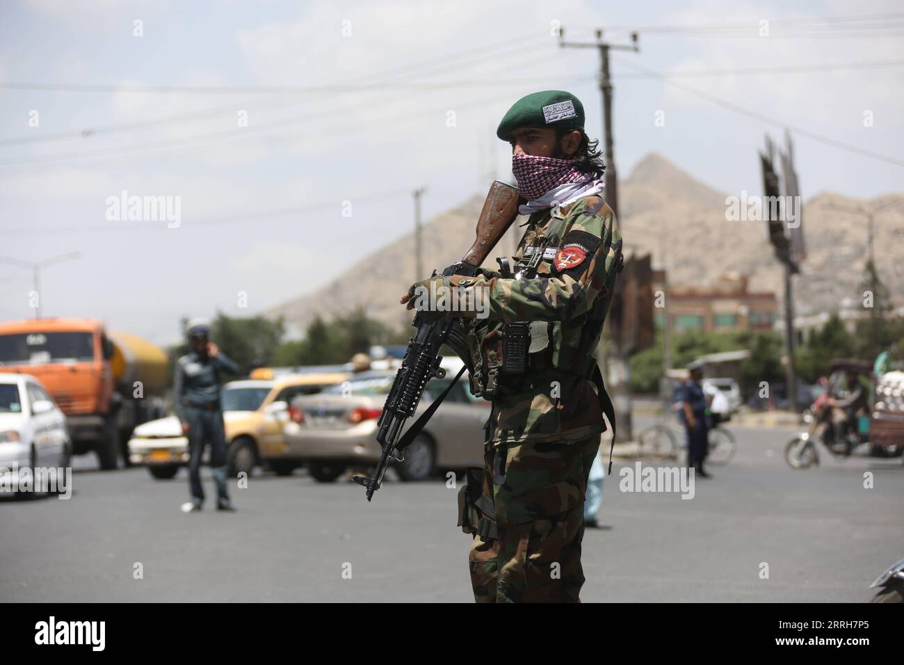 220618 -- KABUL, June 18, 2022 -- Afghan security force members stand guard near the site of three explosions in Kabul, Afghanistan, June 18, 2022. At least two civilians were killed and three security forces wounded on Saturday after three explosions hit a Sikh-Hindu temple in Police District 4 in Kabul, capital of Afghanistan, according to multiple sources. Photo by /Xinhua AFGHANISTAN-KABUL-EXPLOSIONS SaifurahmanxSafi PUBLICATIONxNOTxINxCHN Stock Photo