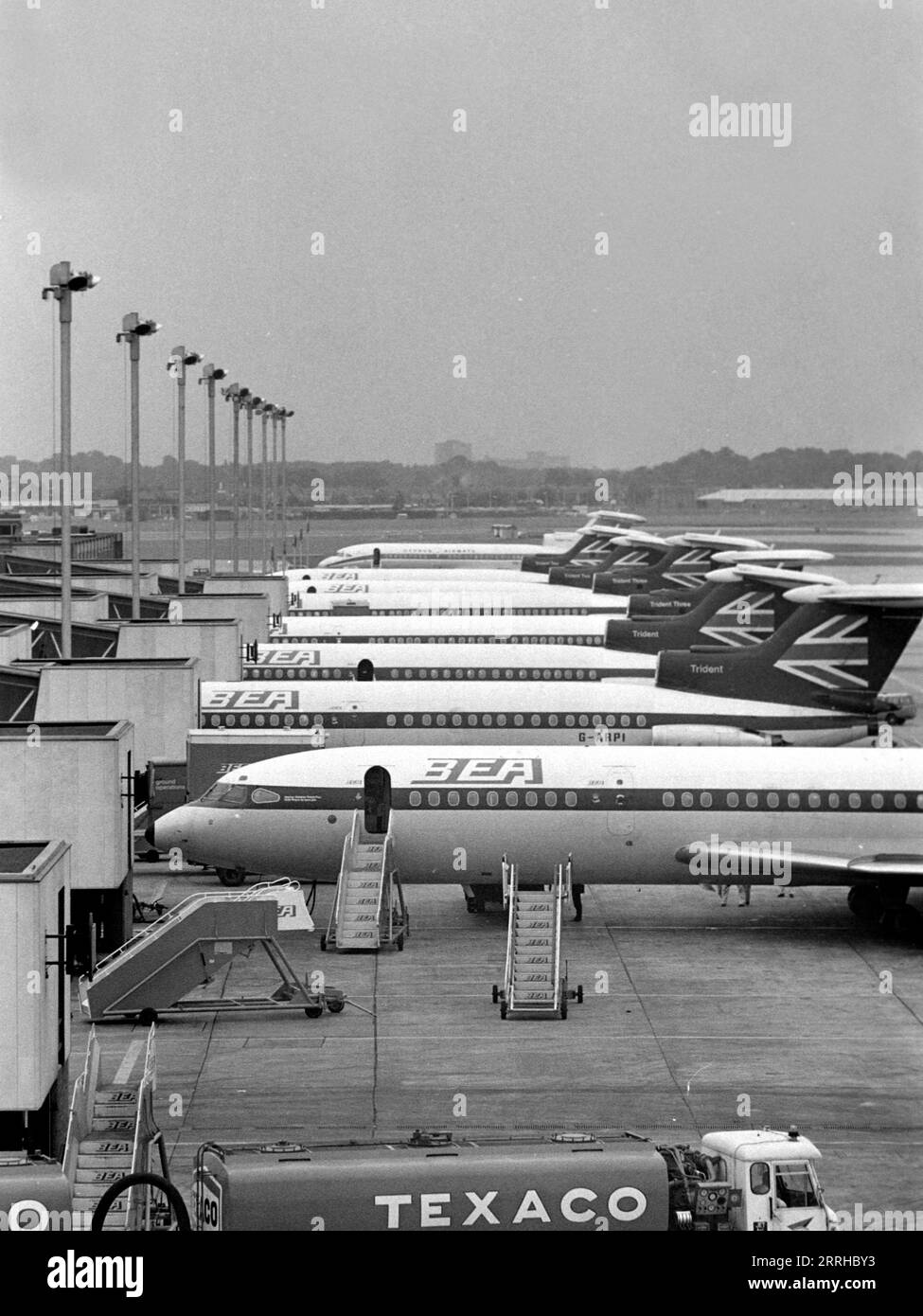 BEA (British European Airlines) Hawker Siddeley HS-121 'Trident' jets, Heathrow Airport, London, England 1971.                                           The second plane in this row, G-ARPI, crashed near Heathrow in June 1972, killing all 118 people on board. Stock Photo