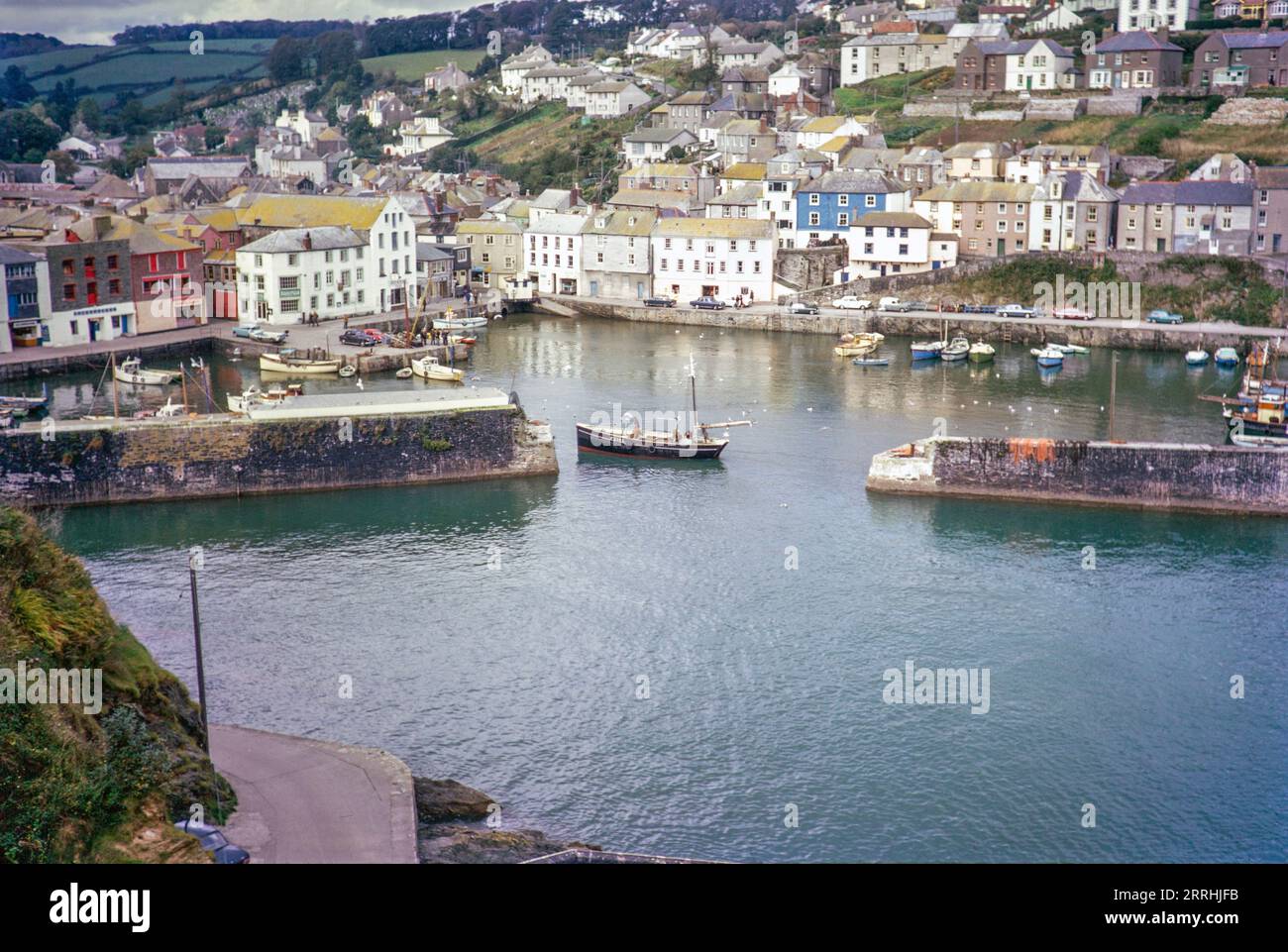Fishing boats in harbour at coastal village of Mevagissey, Cornwall, England, 1967 Stock Photo