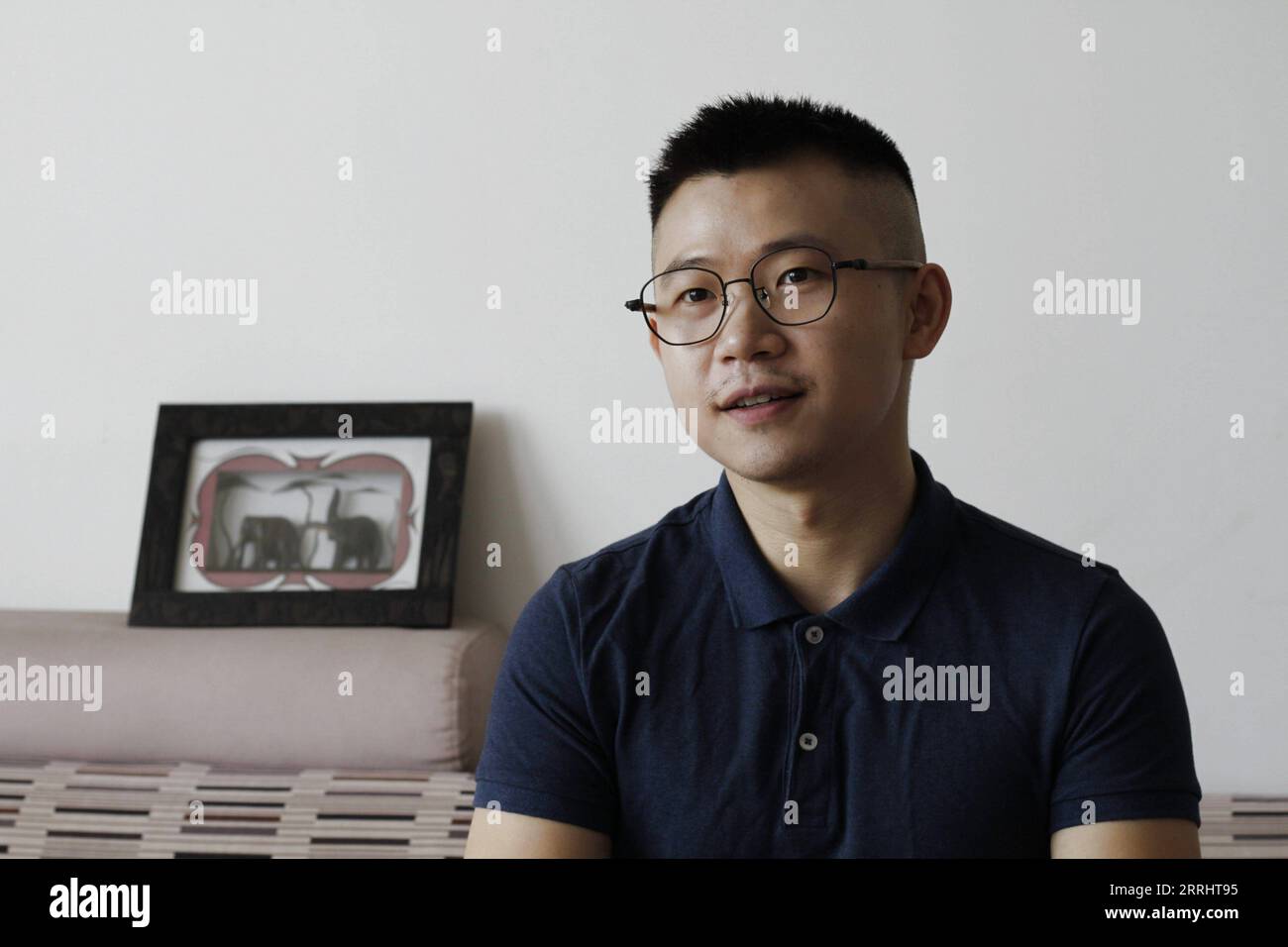 220707 -- DAR ES SALAAM, July 7, 2022 -- Tang Jingyu, a 29-year-old Chinese, speaks during an interview with Xinhua in Dar es Salaam, Tanzania, June 30, 2022. TO GO WITH Feature: Young Chinese speaking fluent Kiswahili promotes China-Tanzania friendship Photo by /Xinhua TANZANIA-DAR ES SALAAM-YOUNG CHINESE-KISWAHILI NurdinxPallangyo PUBLICATIONxNOTxINxCHN Stock Photo