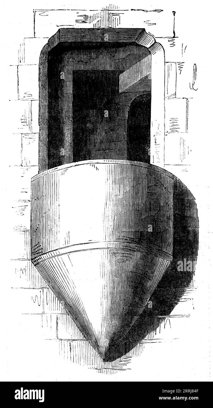 The Minstrels' Niche in the Dining-hall of Durham Castle, 1858. Our Engraving (from a drawing by Cuthbert Bede) represents one of the two minstrel galleries-or rather niches-in the noble dining- hall of Durham Castle, now University College. They project from the wall on each side, at the lower end of the hall, and were constructed by Bishop Fox, in 1499...[In 1503] Bishop Fox entertained here the Princess Margaret, daughter of Henry VII., on her progress to Scotland to espouse the Scottish King, all the nobility and people of distinction being invited to meet her. Before this (in 1448) Henry Stock Photo