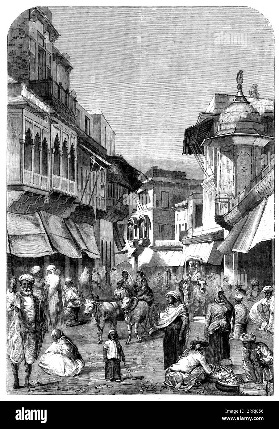 The Main Street of Agra, 1858. 'This city, once the capital of India, is now much decayed, and consists of little more than this one street, running parallel to the Jumna, the rest being mere mud hovels. From the river it must formerly have presented a very striking appearance, being lined with palaces of the nobles, built during the reign of the great Acbar. Their ruins are still massive and imposing; and some tombs, in good preservation, are models of beauty, both in construction and material...The civil and military lines of the Europeans adjoined the city, but were entirely destroyed when Stock Photo