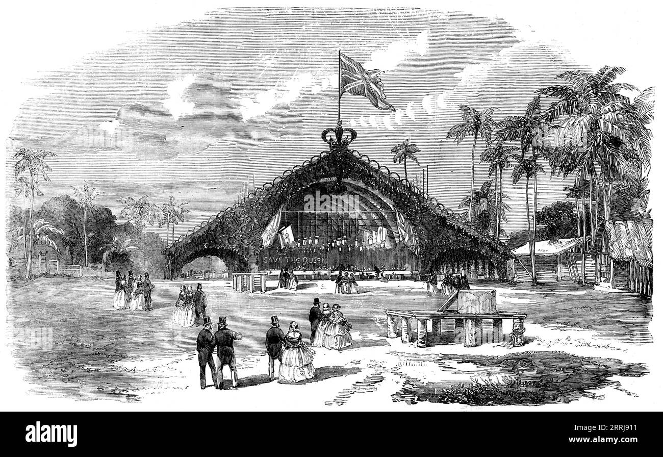 Inauguration of the Ceylon Railway: East End of the Banquet Bungalow, 1858. Engraving from a photograph by Mr. Parting. 'The centre of attraction was, of course, the magnificent bungalow, now fully dressed in richest verdure, studded with gorgeous flowers, and waving with flags inside and out...'God bless Queen Victoria,' in illuminated letters, was conspicuous at the upper end. The scene, in truth, was a rare combination of the primitive elements of humanity and of the representatives of progress and of power - of rule, firm, but gentle and beneficent...[The Governor] his Excellency Sir Henry Stock Photo