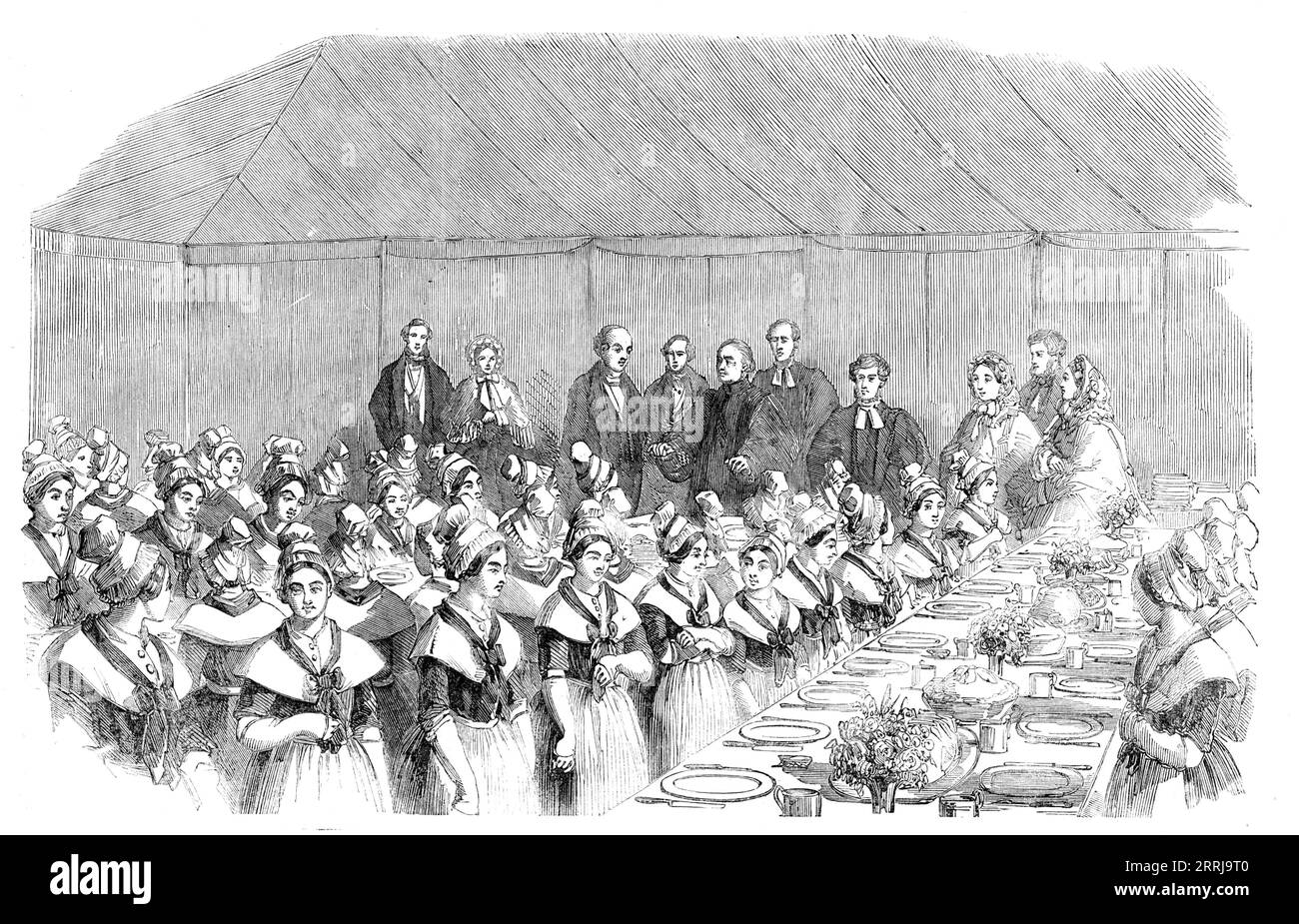 The Centenary Fete of the Asylum for Female Orphans - the Archbishop of Canterbury Saying Grace, 1858. 'The object of the charity is to provide a home for orphan girls, who are admitted between the ages of eight and eleven years. They are brought up as domestic servants, and at a proper age are apprenticed into respectable private families...During the one hundred years this benevolent design has been in operation 2880 orphans have been admitted, nearly the whole of whom have been apprenticed...it was thought that, if a number [of orphans] could be assembled together, it would be the best evid Stock Photo