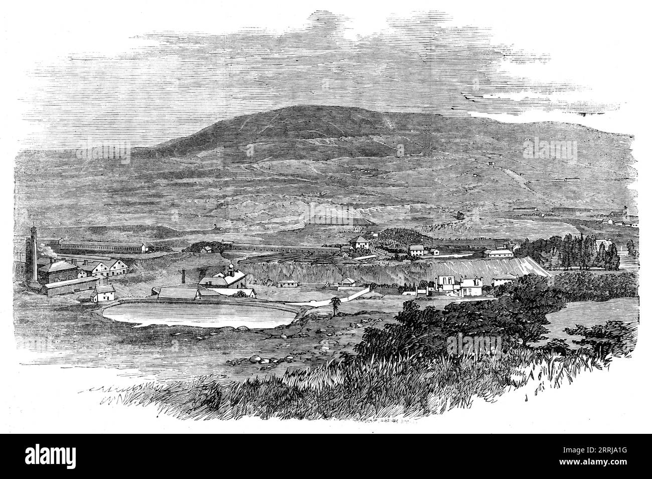 The Valley of Llynvi, Turning the First Turf for a New Railway, 1858. '...the first turf for this new railway was turned, near two of the principal ironworks already in operation, and amidst a vast concourse of people, who all seemed to take a lively interest in the improvement thus commenced, as affording an assurance of additional employment, traffic, and prosperity...The Llynvi Valley is one of a series of picturesque valleys which intersect the hilly counties of Monmouth and Glamorgan, and open into the lower lands bounded by the Bristol Channel. The valleys are rich in iron, coal, and lim Stock Photo
