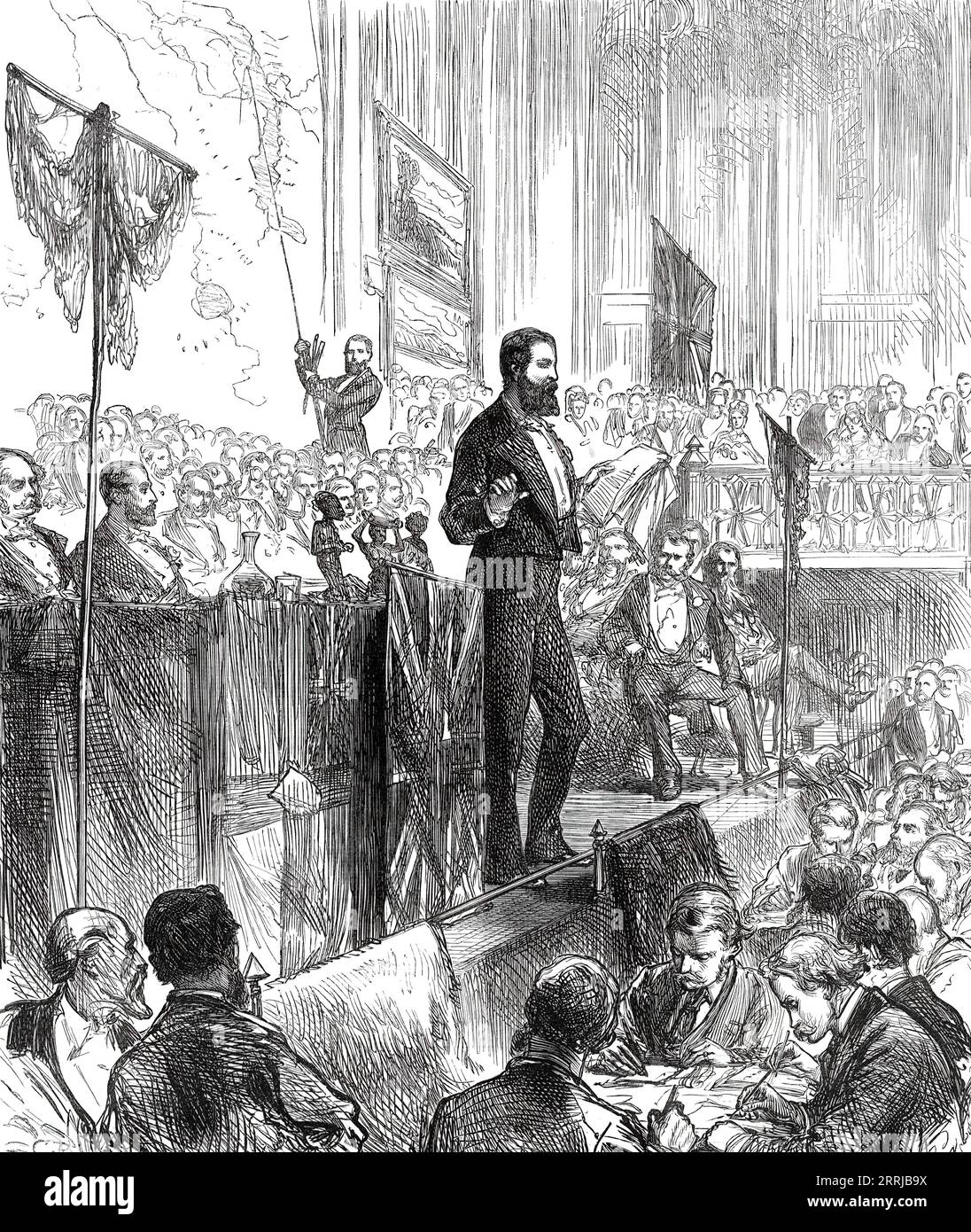 Lieutenant Cameron at the Meeting of the Royal Geographical Society, 1876. 'The lecture which was delivered by [British explorer and naval officer] Lieutenant Cameron on Tuesday week to the members of the Royal Geographical Society and their friends assembled in St. James's Hall was listened to with great interest. The chair was occupied by his Royal Highness the Duke of Edinburgh, for the first time since he has been president of the society...The founder's medal for the year, for the encouragement of geographical science and discovery, was presented to Lieutenant Cameron for his journey acro Stock Photo
