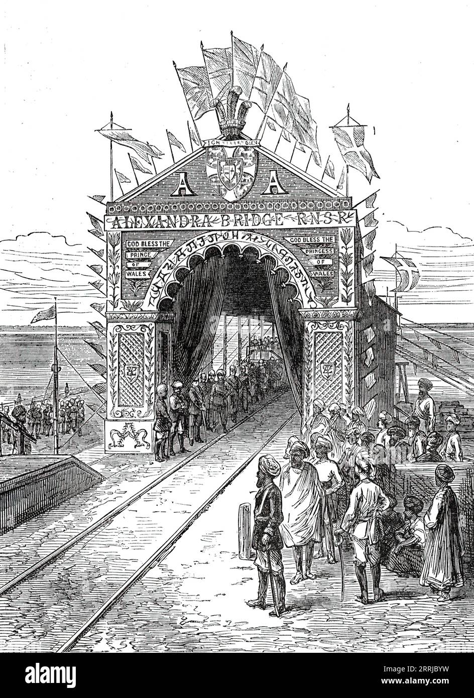 Triumphal Arch on the Alexandra Railway Bridge at Wuzeerabad, from a sketch by one of our special artists,  1876. 'The Prince [of Wales, future King Edward VII) was accompanied by some of the Maharajah's courtiers and nobles...proceeded to Wuzeerabad [Wazirabad], where the Prince was to perform the ceremony of completing and opening the &quot;Alexandra&quot; bridge of the Punjaub Northern State Railway. This railway-bridge over the Chenab has been constructed under the superintendence of Mr. Alexander Grant, C.E., engineeer-in-chief, and Mr. Henry Lambert, executive engineer. It was commenced Stock Photo