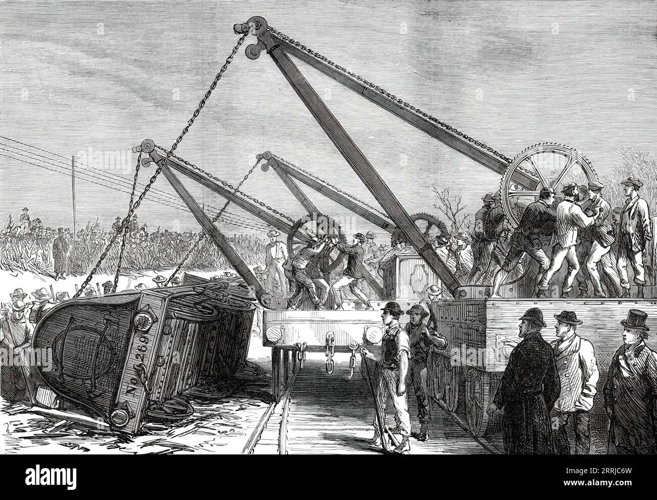 The Railway Accident at Abbotts Ripton, Huntingdon: raising an engine from the wrecked train, 1876. On 21 January 1876, the Edinburgh-London Special Scotch Express was involved in a collision, during a blizzard, with a coal train on the Great Northern Railway main line. A second collision occurred minutes later when an express to Leeds crashed into the wreckage obstructing the northbound line. Thirteen passengers died, and 53 passengers and 6 traincrew members were injured. Factors included signal failure, bad weather and poor visibility. Snow and ice on the wires by which the semaphore arm sh Stock Photo